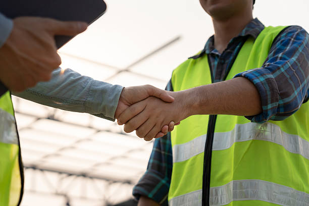 istock Construction team hands shaking greeting start up plan new project contract in office center at construction site, industry ,architecture, partner, teamwork, agreement, property, contacts. 2226224092