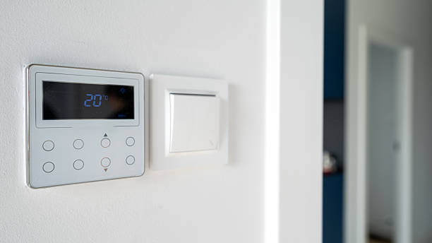 istock Modern smart home thermostat for efficient energy consumption and climate control 2226225049