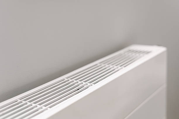 istock Modern electric heater in apartment providing warmth during winter months 2226225128