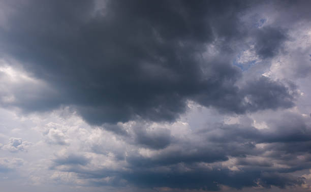 istock Dark sky with stormy clouds. Dramatic sky rain,Dark clouds before a thunder-storm,clouds before rain 2226225743