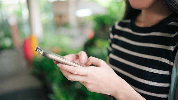 istock seamless human-ai connection individual intuitively interacting with a smartphone in a digitally integrated world 2226226588