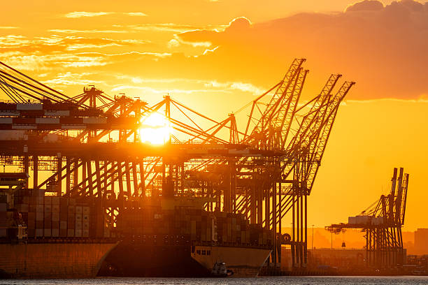 Port in USA in full activity during the sunset showing calm waters and a beautiful sky