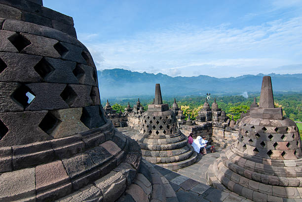Visitors explore the majestic Borobudur Temple, located in Magelang, Central Java, Indonesia. Recognized as the world's largest Buddhist temple and a UNESCO World Heritage Site, Borobudur dates back to the 9th century and is renowned for its intricate stone carvings and stupas. Since the COVID-19 pandemic, access to the upper levels of the temple, where the main stupas are located, has been restricted by the Indonesian government to help preserve the structure and manage crowd control. Despite the limitations, Borobudur remains one of Indonesia’s most iconic cultural and spiritual destinations, attracting both local and international tourists.