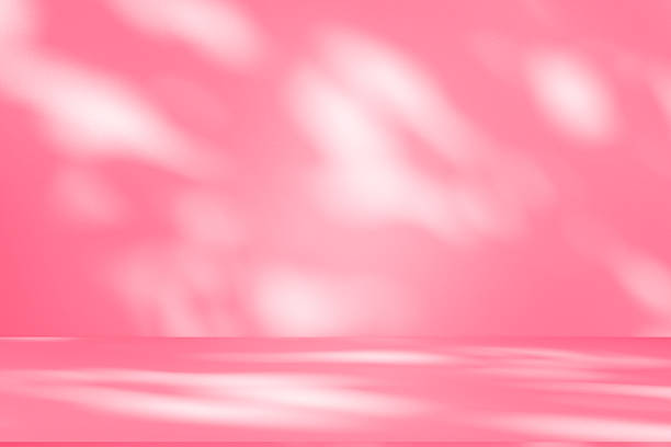 istock Wall interior background, studio, and backdrops show products. with shadow from window color white and pink light. background for text insertion and presentation of product 2226232634