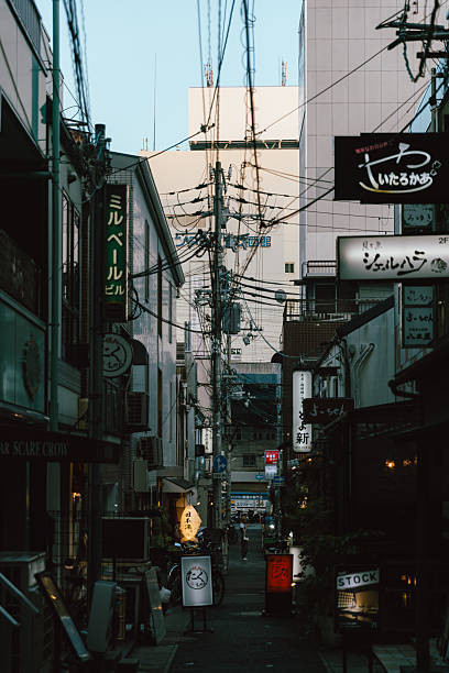 Kobe, Japan - July 12th, 2025 : People walking on the street at Kobe, Japan. kobe is a seaside town next to Osaka in japan, which is famous for kobe beef.