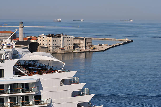 Trieste, Italy - May 11, 2025: Trieste marina aerial view from from cruise ship. The streets of Trieste with the facades of old and colorful Mediterranean houses. Trieste at Italy