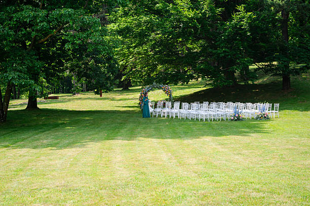 istock Wedding ceremony setup on lawn at daytime in summer 2226240661