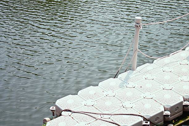 Soft Tones and Stillness of Minimalist Floating Dock Over Calm Waters