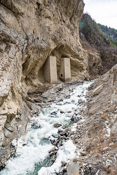 istock Ancient Watchtowers in Argun Gorge with Scenic River 2226245234