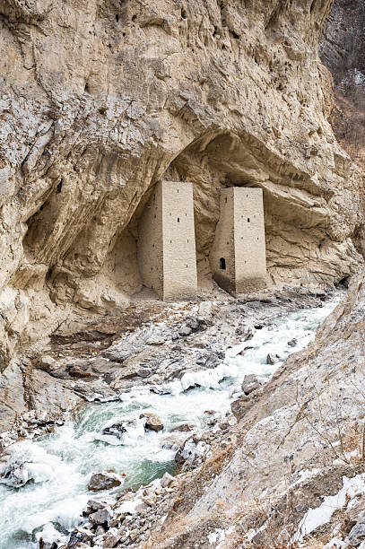 istock Ancient Watchtowers in Argun Gorge with Scenic River 2226245242