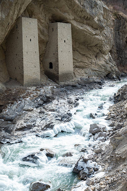 istock Ancient Watchtowers in Argun Gorge with Scenic River 2226245245