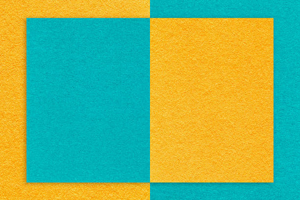 istock Texture yellow and turquoise paper background with geometric shape, macro. Structure craft cerulean cardboard 2226246485