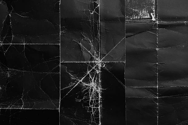 istock Old black paper background with wrinkles and scuffs 2226246560