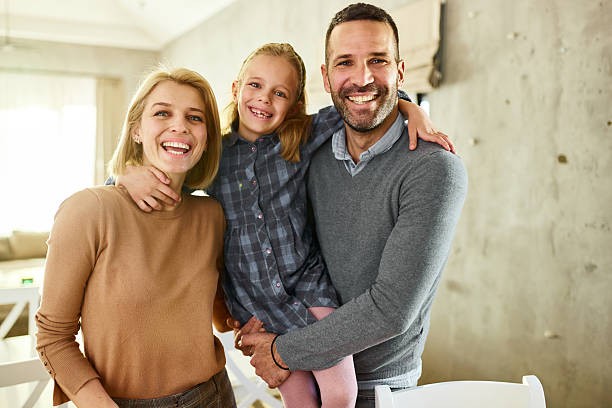 istock Happy embraced family enjoying at home. 2226247783