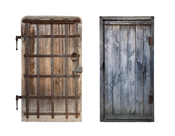 istock Old wooden closed door isolated on white background. 2226250859
