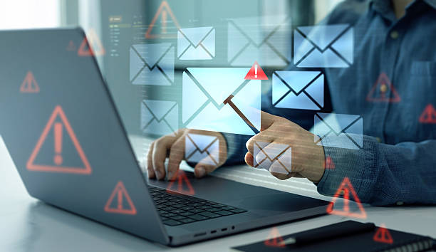 istock Email security and virus spam alert in email. Fake text email scam.Scammers online.Cyber scam. Spam email message on digital screen. 2226253396