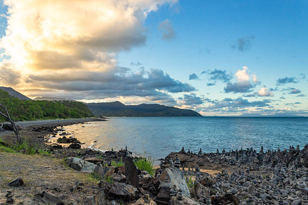 Captain Cook Highway Rock Stacks. Balanced rock stacks line the shoreline in Far North Queensland, Australia. Carefully placed stone formations , set against a backdrop of the Coral Sea.
