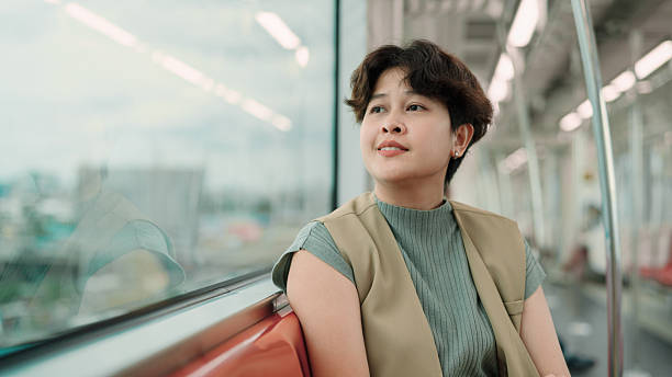 istock Businesswoman commuting by sky train 2226256853