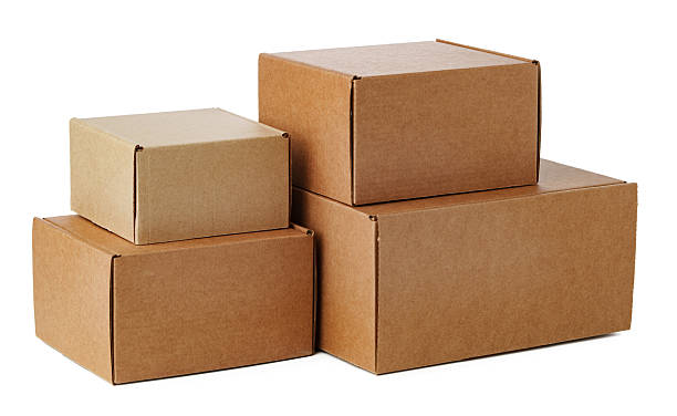istock Stacked brown cardboard boxes in various sizes arranged on a white background 2226259037