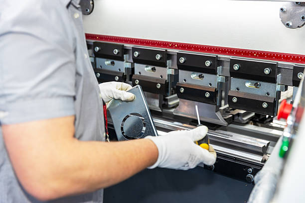 istock Technician operating CNC press brake machine in factory 2226264590
