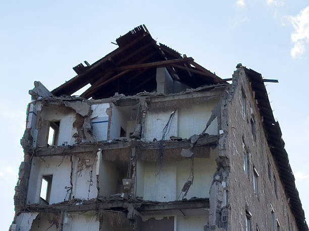 istock Partially collapsed concrete building with exposed floors and damaged roof 2226265563