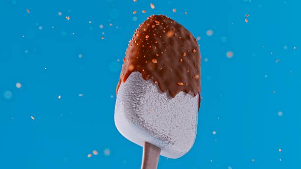 istock Ice cream with icing of chocolate color, covered with nuts. 3d render on a blue isolated background. 2226266478