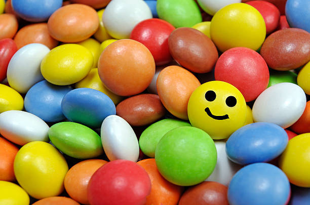 istock Multicolored chocolate dragee. Chocolate candy dragees covered colorful glaze 2226267120