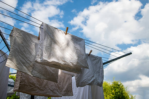 istock Laundry hanging on a rotary washing. 2226268915