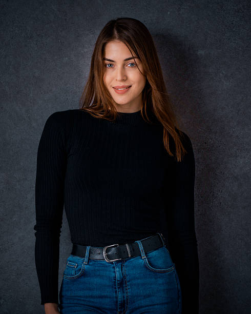 istock Attractive brunette haired woman standing against isolated background 2226269280