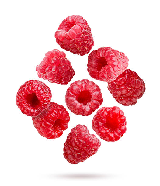istock Ripe strawberries flying close-up on a white. Isolated 2226270374