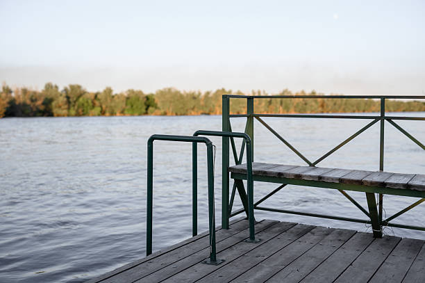 istock Pier with wooden decking and metal railings 2226270547