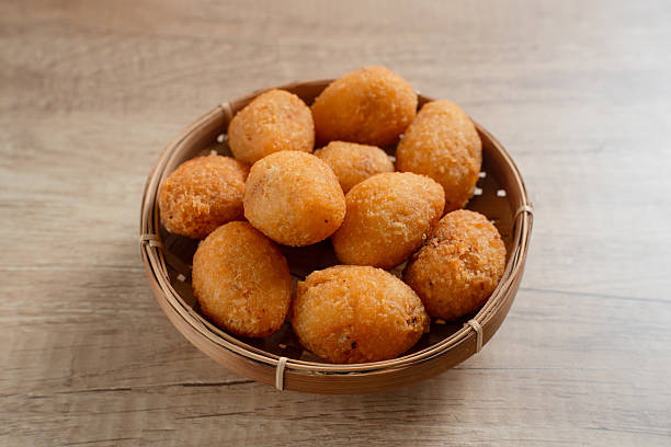 istock Combro is a typical Sundanese fried food. Combro is made from grated cassava which is shaped round or oval and filled with oncom and chili sauce and then fried. 2226270961