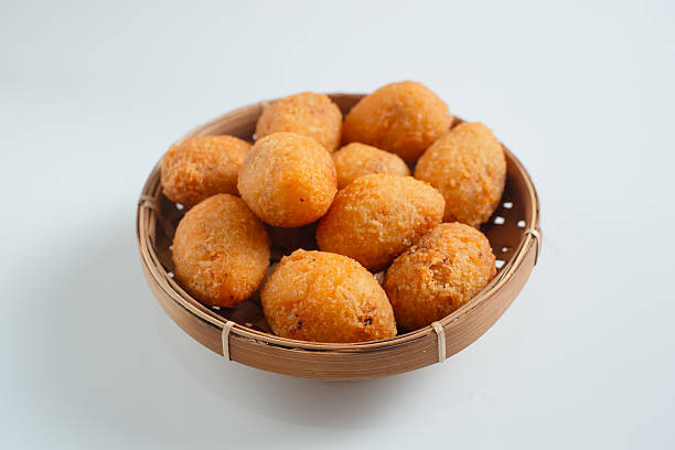 istock Combro is a typical Sundanese fried food. Combro is made from grated cassava which is shaped round or oval and filled with oncom and chili sauce and then fried. 2226270973