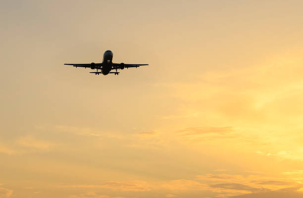 istock Plane flying with clearly sky at sunset 2226273842