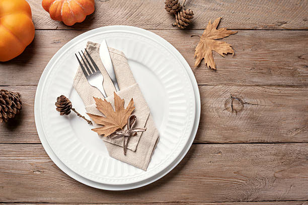 istock Autumn table setting with pumpkins and maple leaves. 2226274711