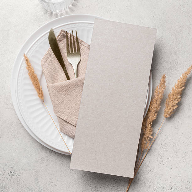istock Blank 4x9 menu card on table setting with dry plants 2226274754