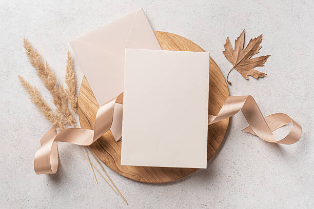 istock Blank invitation card template with dry plants and ribbon 2226275233