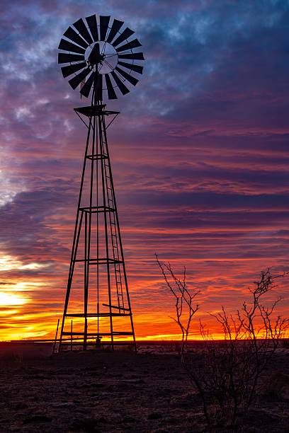 istock Vintage Windmill at Sunset on Texas Desert Plain 2226275974