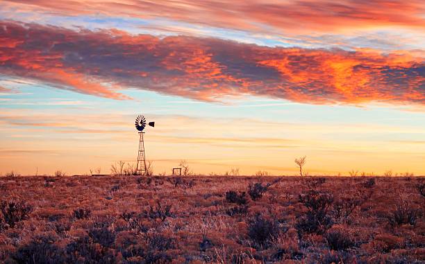 istock Old Windmill at Sunset on Texas Plains 2226275984