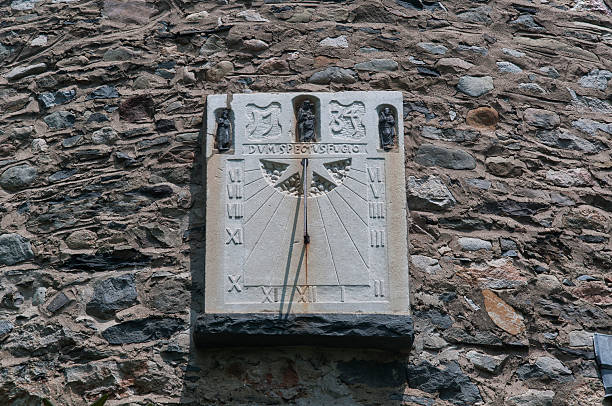 an ancient sundial on the stone tower at Grey Towers historic site in Milford, Pennsylvania.