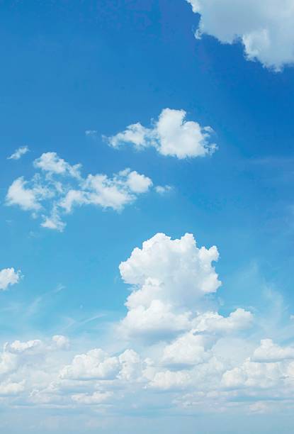 Blue sky with beautiful white clouds. Sky with cumulus and cirrocumulus clouds.