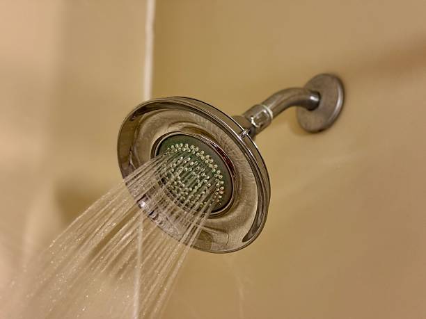 istock Water flowing from shower head 2226286453