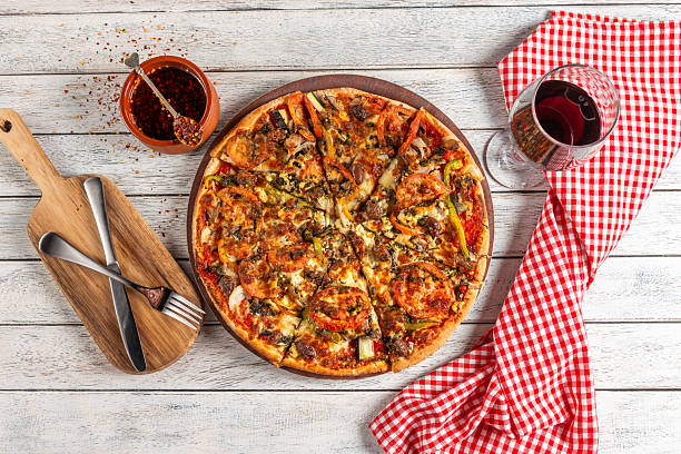istock Delicious Pizza With Toppings & Wine 2226288027