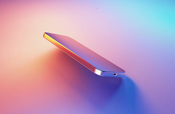 Smartphone Illuminated By Blue And Magenta Lights On Blue And Pink Background