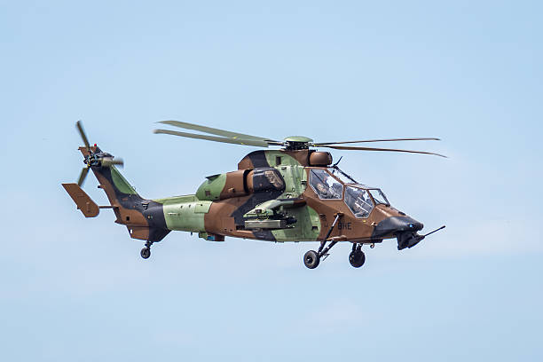 Dugny, France - June 20, 2025: Three-quarter right front view of a French Army Tiger helicopter in flight, a multirole attack helicopter developed by Airbus Helicopters and put into service in 2003.
