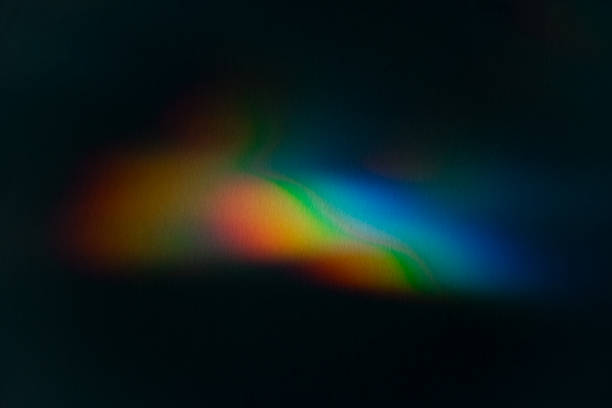 istock effect with rainbow refraction of light on a wall. 2226294749