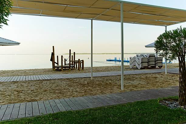 istock Beach on Lake Narach, Belarus, at sunset. 2226296184