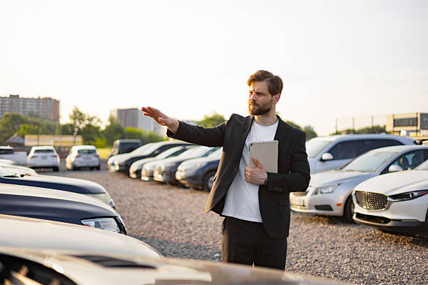 istock Car Salesman at a Dealership 2226297926