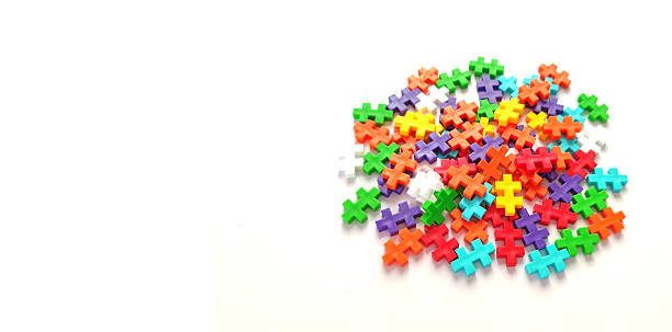istock Stack of colorful jigsaw puzzle on white background 2226298146