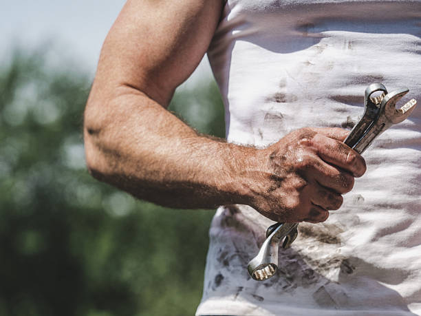 istock Attractive worker, spanner and dirty t-shirt 2226298404